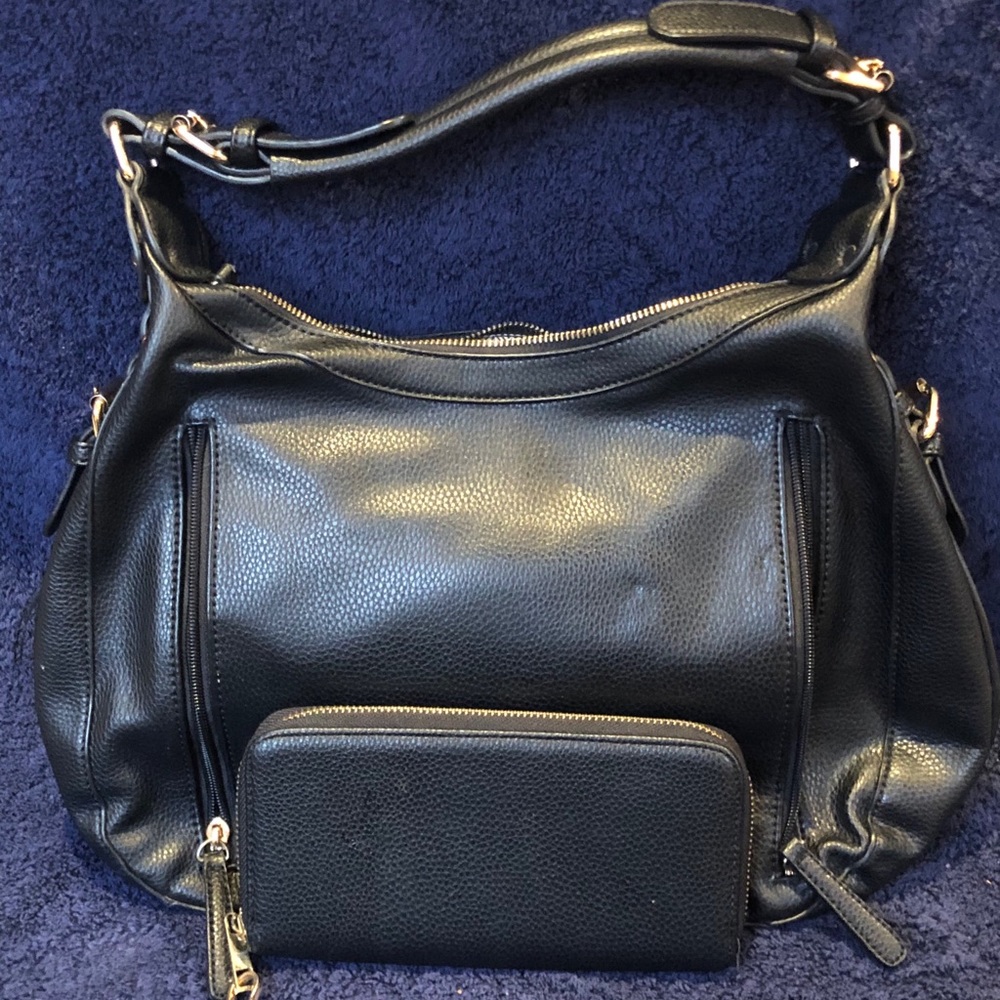 Purse and wallet combo. Includes small small bag.